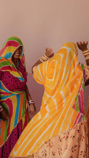 zazi-vintage-artisanal-partners-saheli-women-dancing-colorful